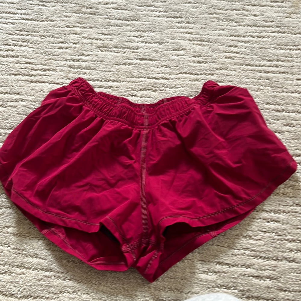 Jolyn red “Doyle” athletic shorts